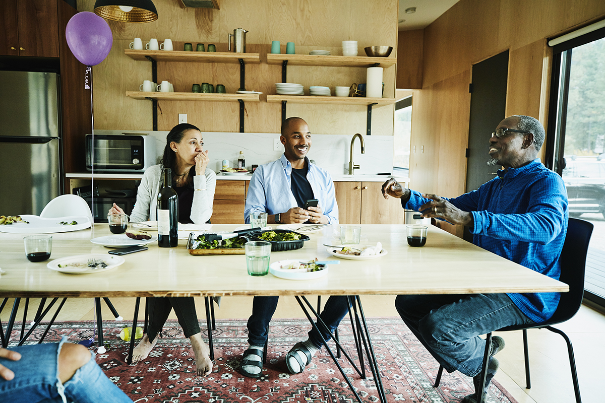 Parents round the table with their adult children