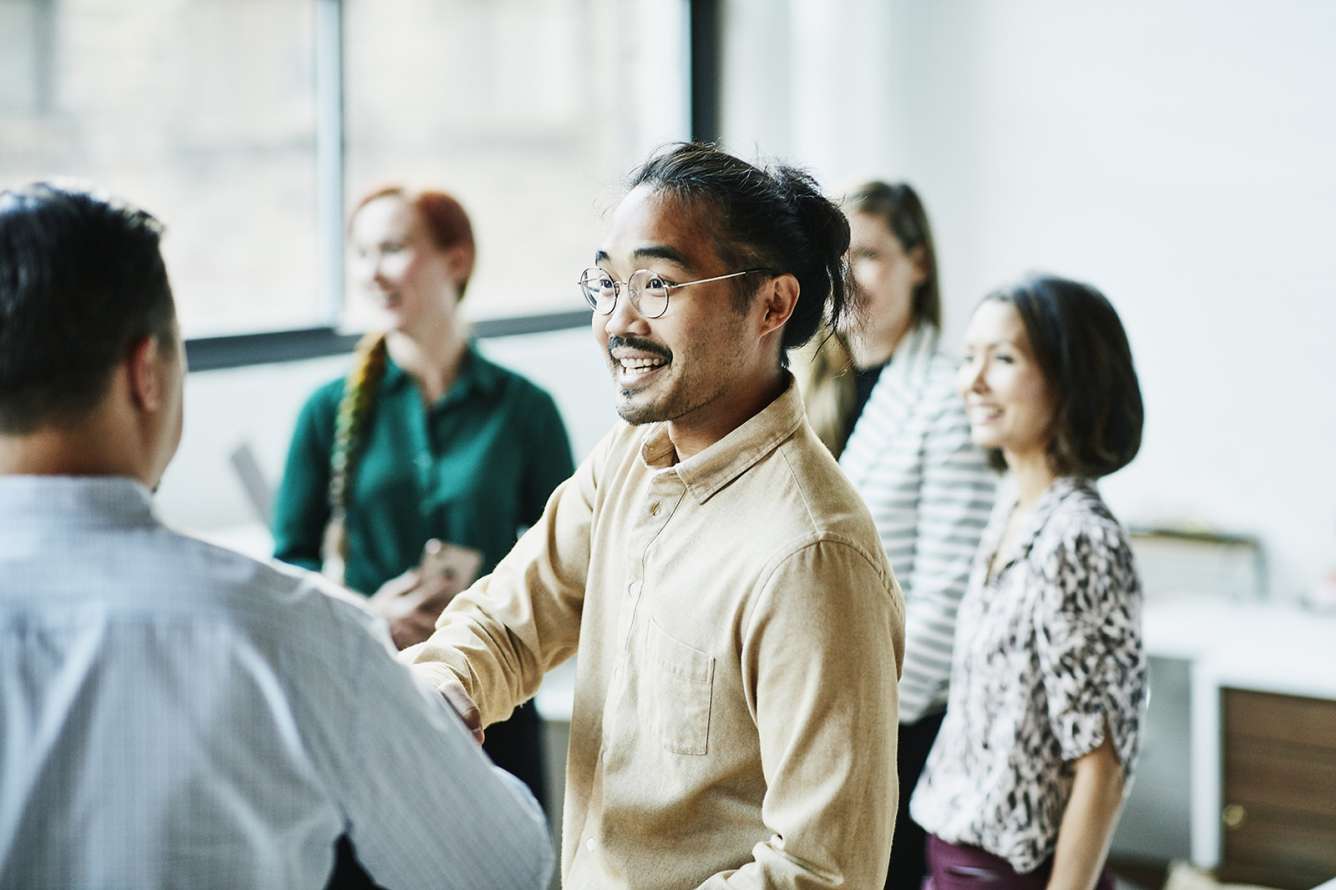 A diverse group of people at a business meeting