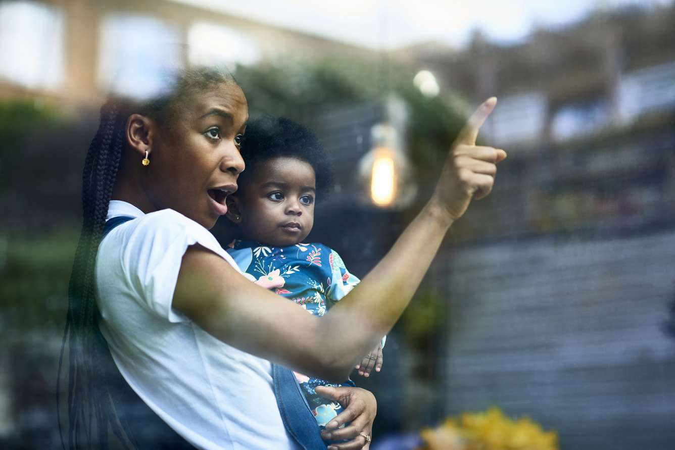 Woman and baby in a house