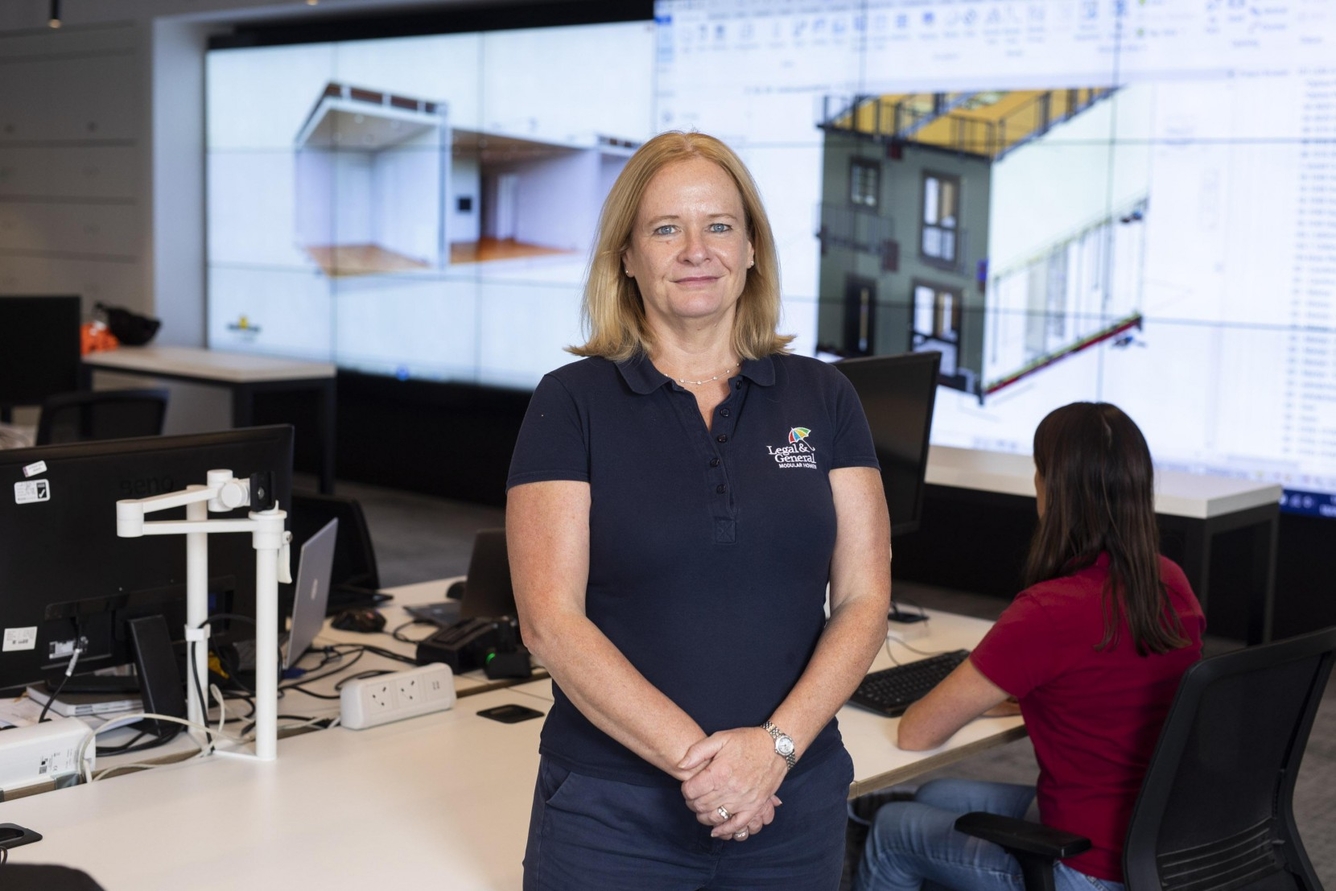 Woman in front of 3D designs