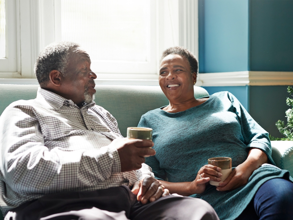 Retired couple sitting on the sofa