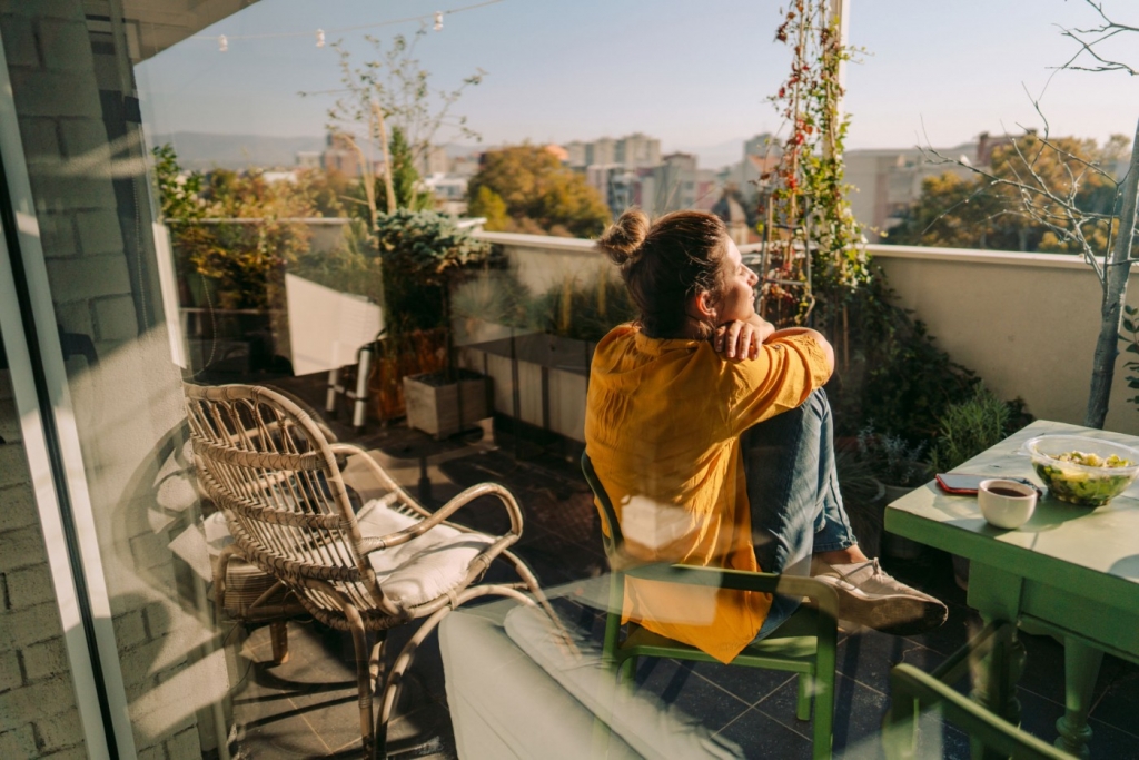 Woman sitting on a balcony