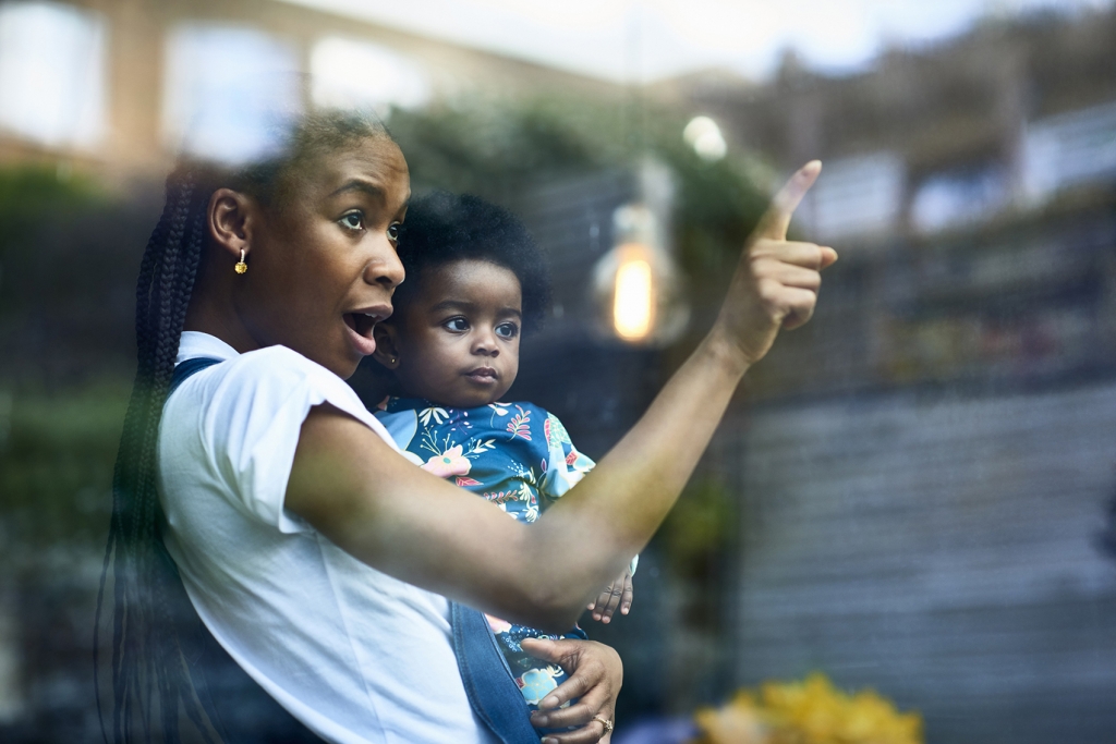 Woman and baby in a house