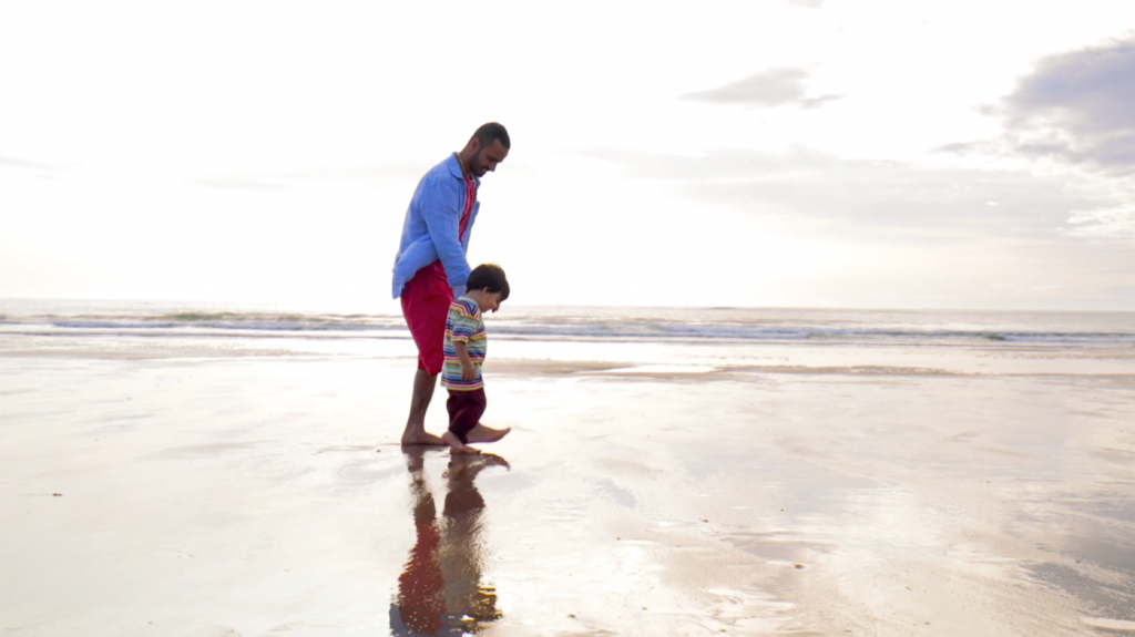 Father and son on the beach